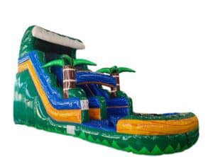 Vibrant inflatable water slide with multiple slides and climbing areas for children.