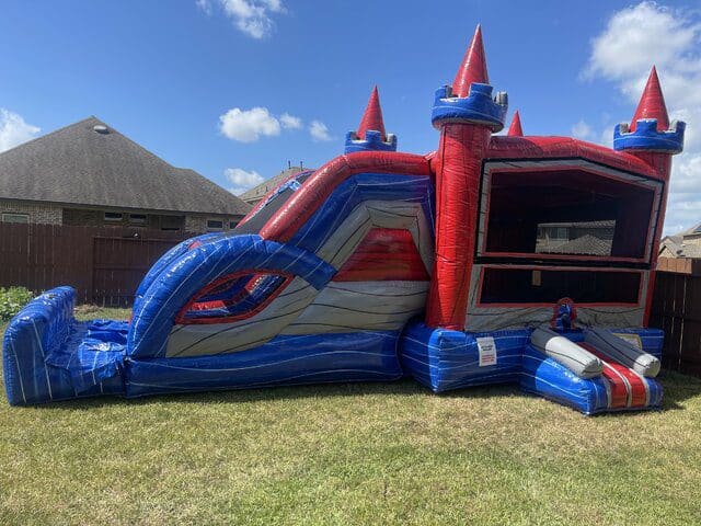 Colorful inflatable castle bounce house with turrets for kids' parties.