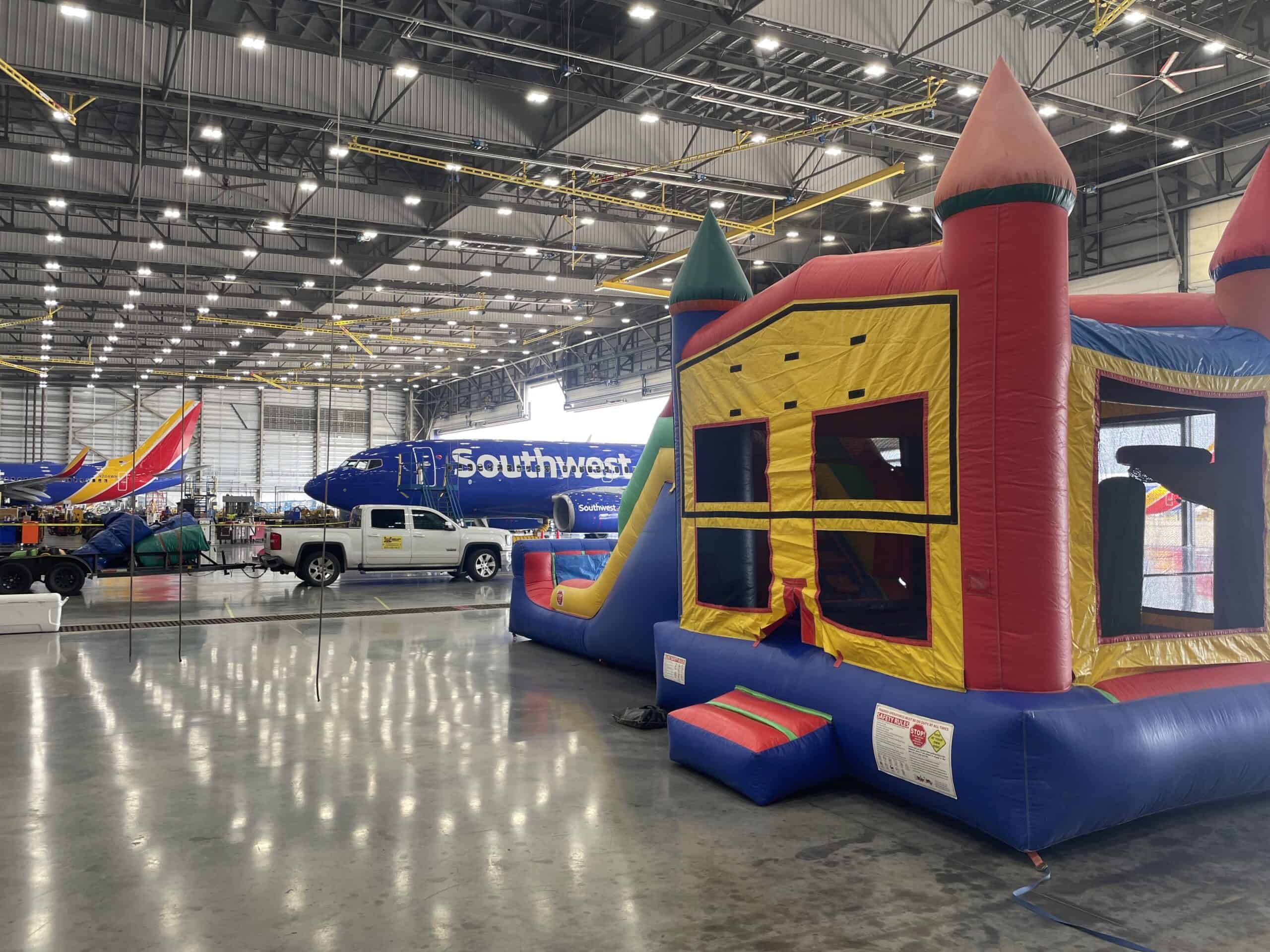 Indoor Party Kids Bounce House and Airplane Indoor party venue with bounce house and airplane for kids.