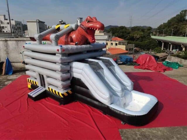 T-Rex Water Slide for Rent Inflatable T-Rex themed water slide for kids parties and events.