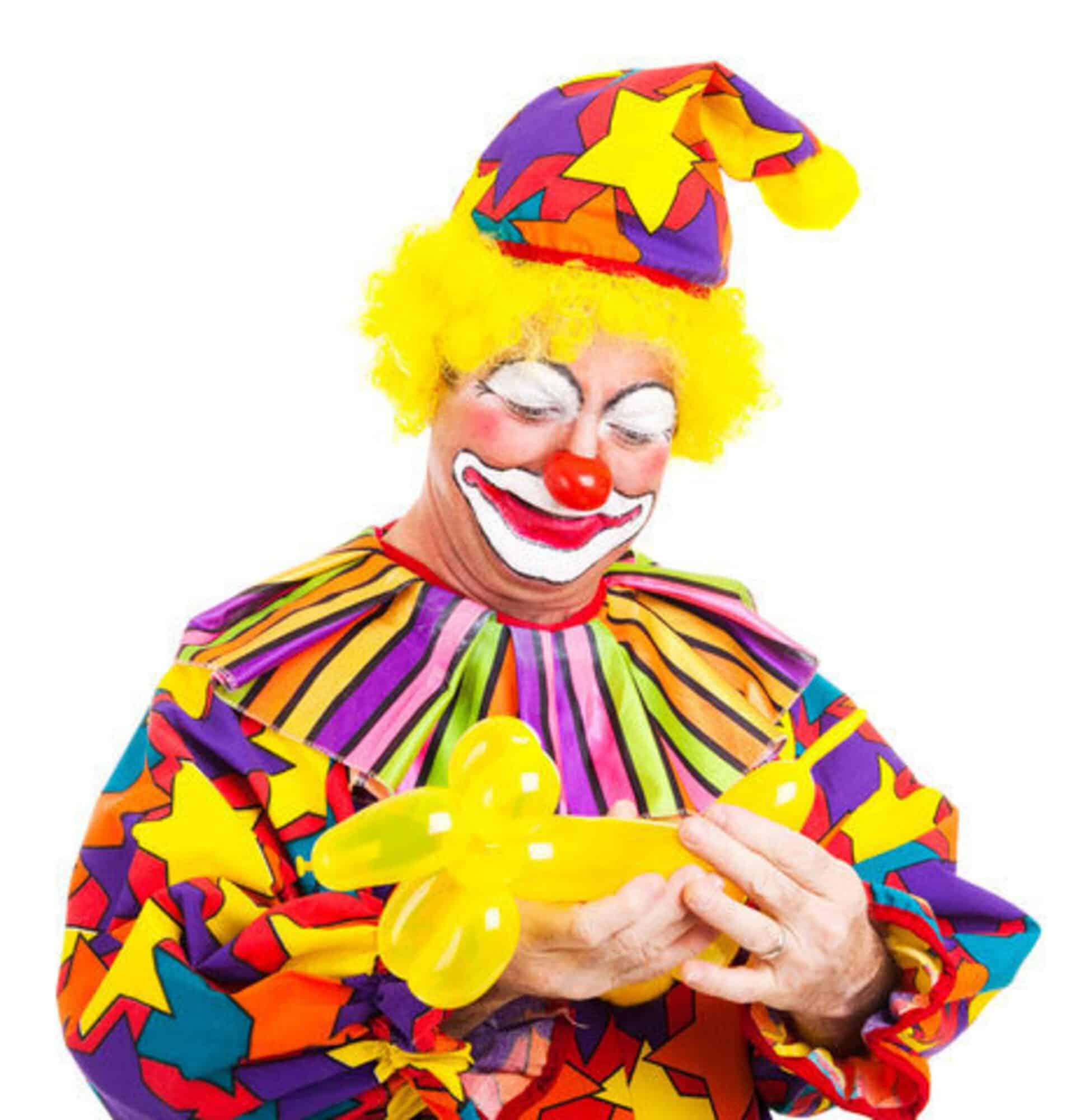 Party Kids America Clown Costume Colorful clown in party costume with balloon animal at Party Kids America.