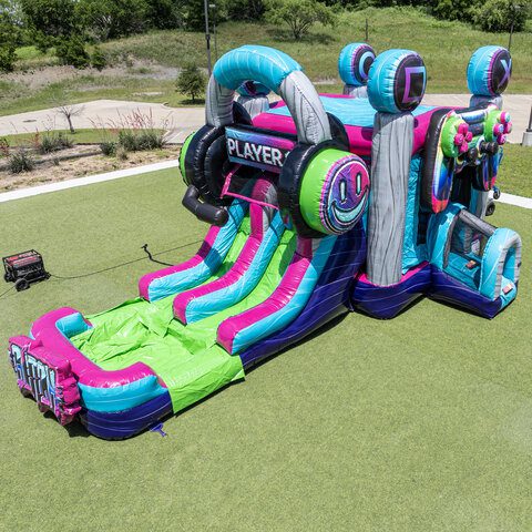 Gamer Glitch Level Up Dual Slide Combo Colorful gamer-themed inflatable dual slide combo for kids.